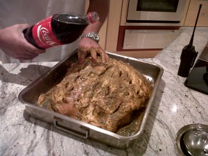 pour Coca Cola into the holes of the pork leg pour Coca Cola into the holes of the pork leg