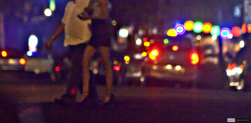 Couple crossing street in Jaco
