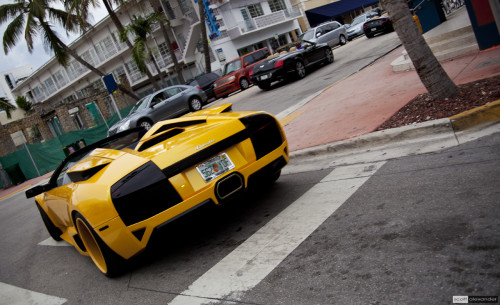 One Lamborghini, Two Aston Martins