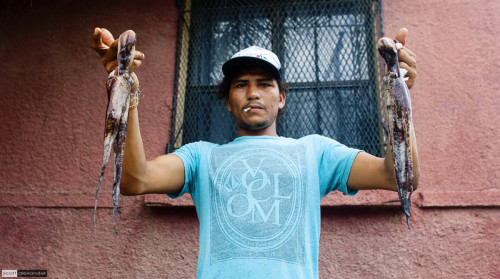 I love when people want me to take their photos.  Like this guy with his pulpo (octopus).
