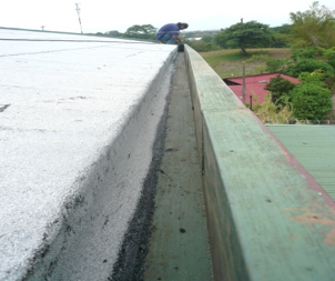 a gutter alongside a residential roof costa rica a gutter alongside a residential roof costa rica