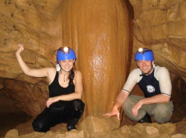 Couple of tourists in cave at Cavernas el Venado