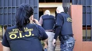 OIJ agents on a 2012 raid.